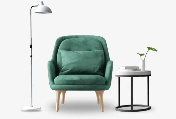 Zielony fotel i lapma stojąca - element dekoracyjny