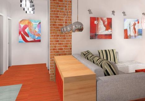 Projekt i aranżacja mieszkania w kamienicy ze ścianą z cegły w tle