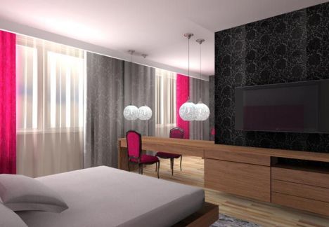 architekt wnętrz MKdezere - projekt sypialni z funkcjonalną strefą telewizyjną i toaletką