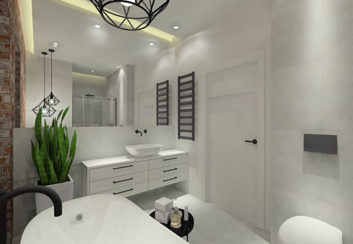 Łazienka z cegłą i betonem w łazience.