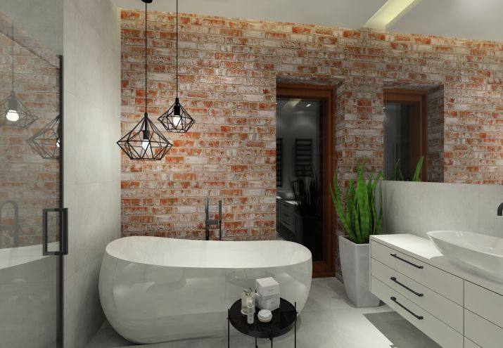 Nowoczesna łazienka z cegłą na ścianie.