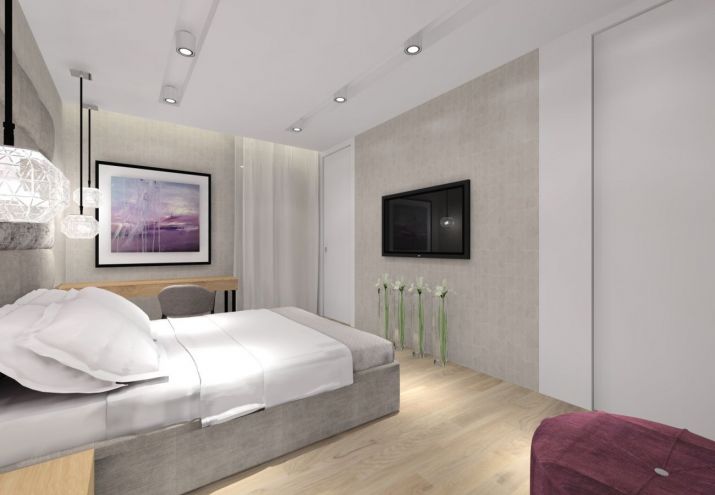 Projekt nowoczesnego, salonu połączonego z kuchnią i jadalnią.