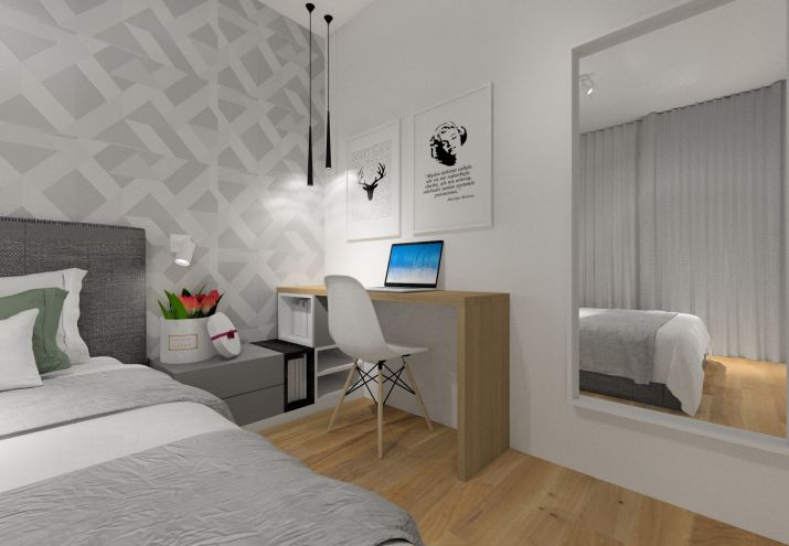 Aranżacja sypialni z biurkiem.