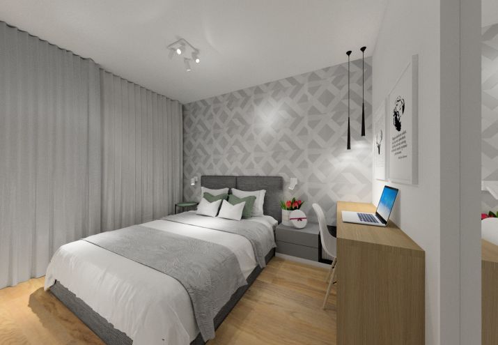Przytulna sypialnia w szarościach.